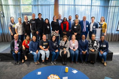 Senator Becker, top row, fifth from the left, pictured with community leaders, educators, and Genentech employees at the 10th anniversary celebration of Futurelab.