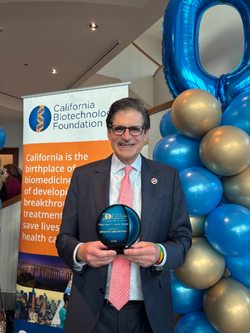 Senator Becker receiving the Enduring Champion Award from the California Biotechnology Foundation