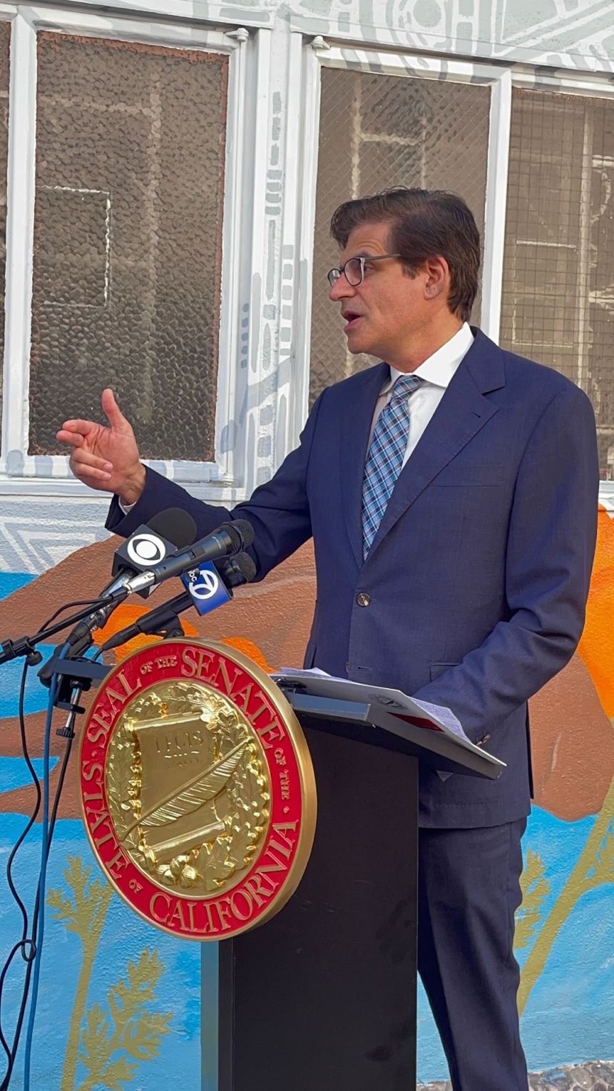Pictured here: Senator Becker holding a press conference to discussion pending legislation.